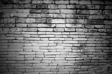 Wall the style vintage black gray background of old cement brick texture has white many horizontal block which are beautiful.