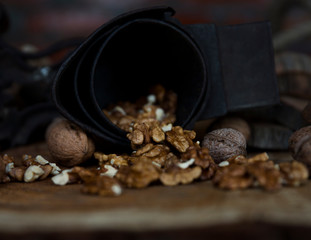 Walnuts on Rustic Old Table with Vintage Hand Grinder