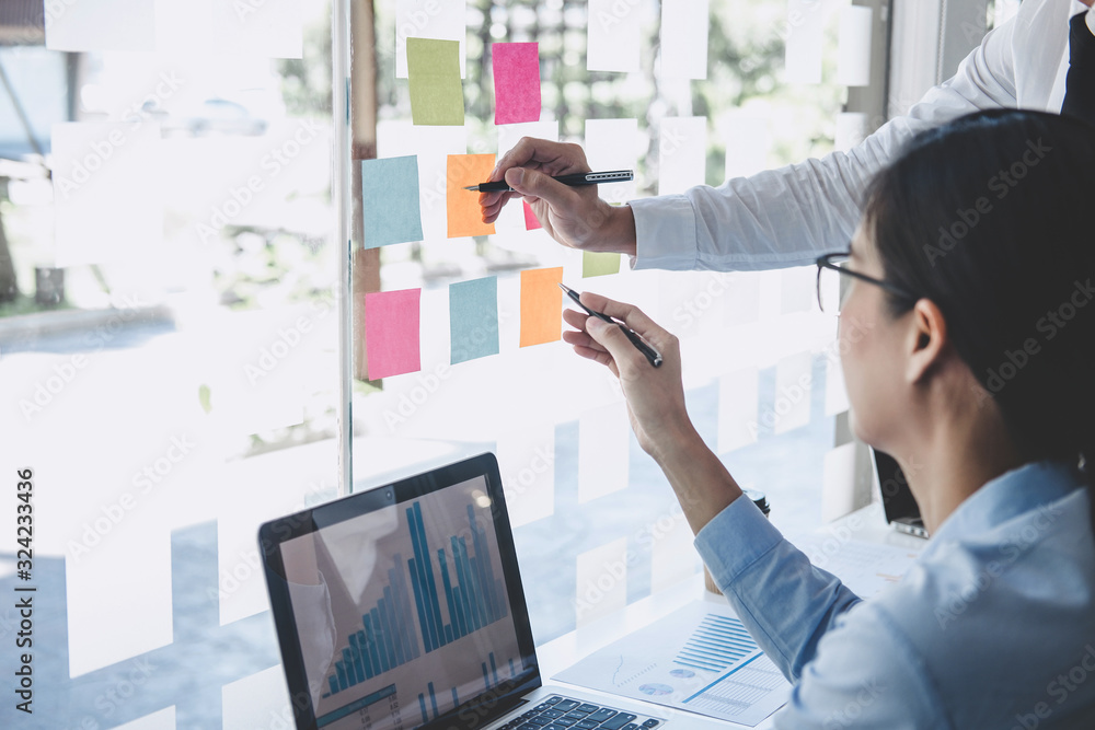 Poster teamwork of business team consulting market growth on financial document graph report statistics, us