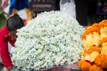 Mapusa India Counter on the market in india goa. Ritual flower decorations are sold for a gift to the gods at a ceremony in temples. Garlands of flowers. Hinduism. Buddhism. Asian countries