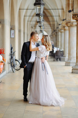Obraz premium Two lovers walk along Krakow
