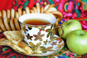 Traditional pancakes and tea at the Russian Shrovetide