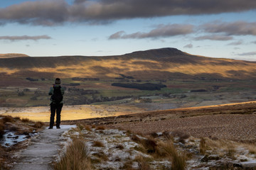 Hiker looking at view