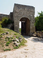 Ancient fortress gates of a cave city in the mountains of Crimea.