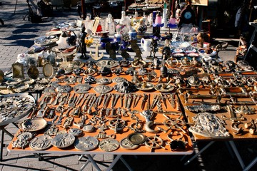Souvenirs and vintage items on a stall at street market in Athens. Greece