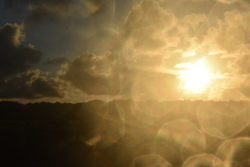 sky with clouds and sun