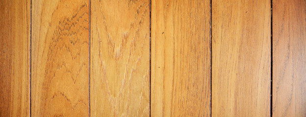 Fototapeta premium Banner sized background photo of boat top deck made with teak exotic wood (Tecona grandis).