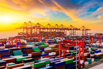 Foto op Canvas Industrial port container freight terminal at beautiful sunset in Shanghai,China. © ABCDstock