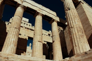 Ancient columns of Propylaea gateway on the Acropolis hill in Athens, Greece.