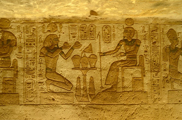 Fototapeta na wymiar Interior of Abu Simbel with intrigue mural and egyptian hieroglyphs.