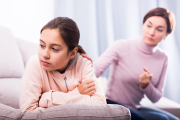 Mother reprimands her daughter