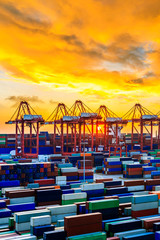 Fototapeta na wymiar Industrial port container freight terminal at beautiful sunset in Shanghai,China.