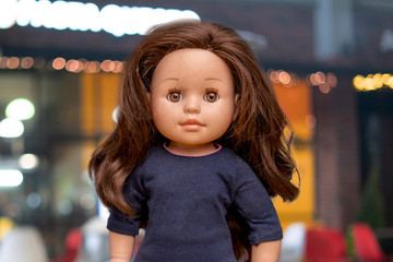 beautiful female doll face portrait close up with copy space, girl childhood toys
