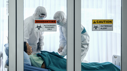 coronavirus covid 19 infected patient in quarantine room with quarantine and outbreak alert sign at...