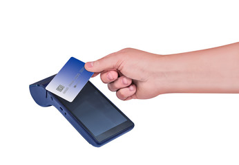 Modern blue payment terminal. Payment with a magnetic tape card. Hand holding a card. Isolated on white.