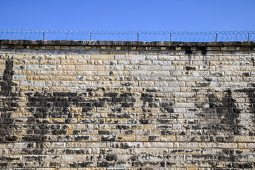 Abandoned and historic prison wall