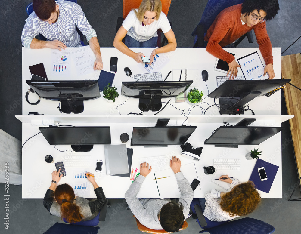 Poster Top view of business group working with computers at office
