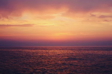 Foto op Canvas over the sea and sunset © ysphotomedia
