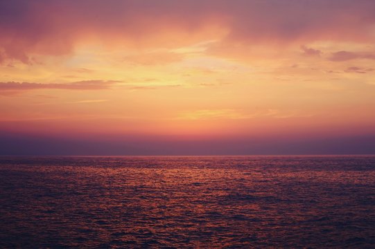 over the sea and sunset