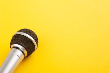 Microphone closeup on yellow
