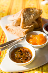 Bowls with homemade passion fruit jam.