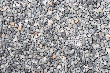 The background of small stones densely arranged