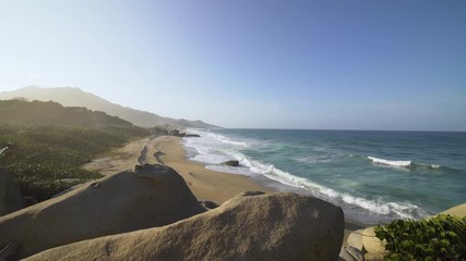 Beautiful bay with white sand beach and blue water in Tayrona national park in Colombia