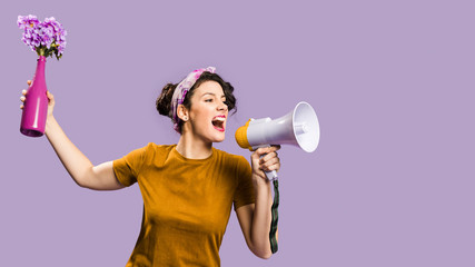 Woman throwing a vase with flowers and screams in megaphone