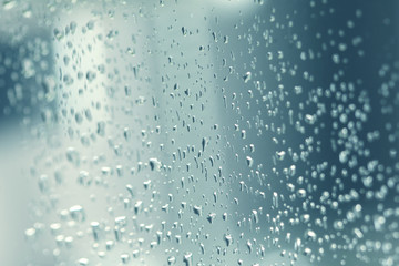 Naklejka na ściany i meble water drops on shower cabine glass with copy space for your text