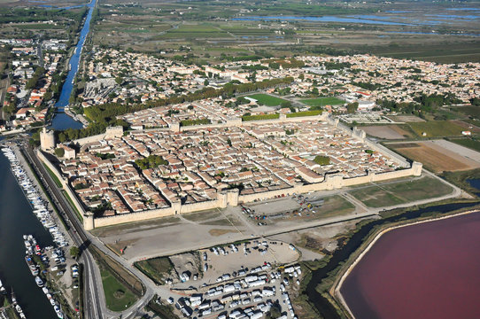Aerial view of the famous town and city walls of Aigues-Mortes in Occitanie, South of France