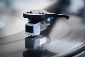 Close up of Vinyl record player needle on turntable