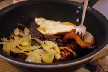 Frying pan with fried food