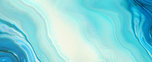 Fototapeta premium Very beautiful abstract ART background - random free mixing of paints in technique of liquid acrylic. Artistic image of swirl veins marble texture in blue turquoise tones, ultra wide format banner.