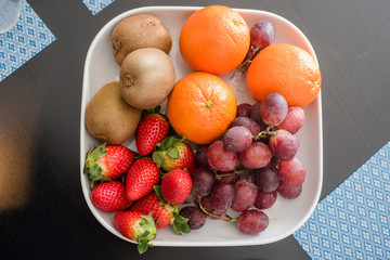 Fresh mixed fruits on plate