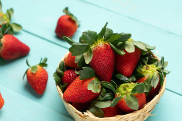 Strawberry fruit on  turquoise background