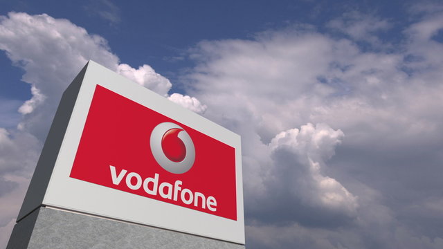 VODAFONE logo against sky background, editorial 3D rendering