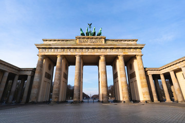 The famous Brandenburg Gate in Berlin in front of a clear blue sky