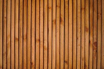 Wooden background made of thin slats or plank