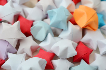 Colorful origami lucky stars background
