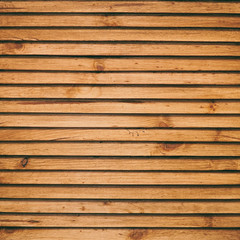Wooden background made of thin slats or plank