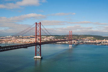 Fototapeta premium 25 de Abril Bridge on a sunny, clear day, Lisbon, Portugal