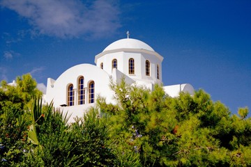 Fototapeta na wymiar Greece, Spetses island, Saronic gulf, the church of Agios Nikolaos in the old harbour.