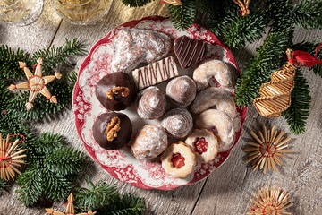 Beehives, vanille crescents and other typical Czech Christmas cookies on a plate