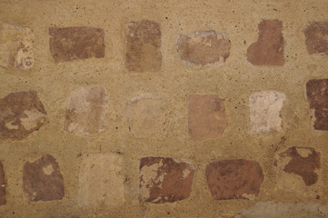 Textura de muralla antigua plana hecha de ladrillos vistos de forma cuadrada con cemento color...
