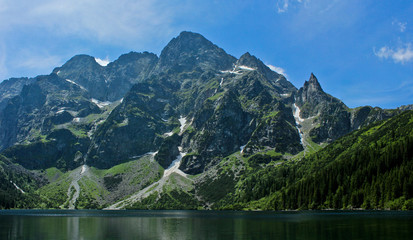 Fototapeta na wymiar The lake Morskie Oko or Eye of the Sea. Western Carpathian mountains. The Tatra National Park in the Rybi Potok (the Fish Brook) Valley, Zakopane, Poland.