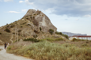 Fototapeta na wymiar Stone Mountain near the Genoese Fortress in the Sudak Bay