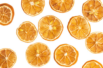 Obraz premium slices of dried lemon, isolated on white background. Top view