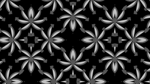Graphic motif in black and white composed of floral motifs with stroboscopic and hypnotic effect, which rotates clockwise and increases in size