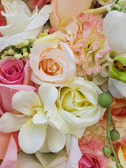 Beautiful multicolored artificial flowers background