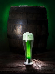 still life with old barrel and green beer